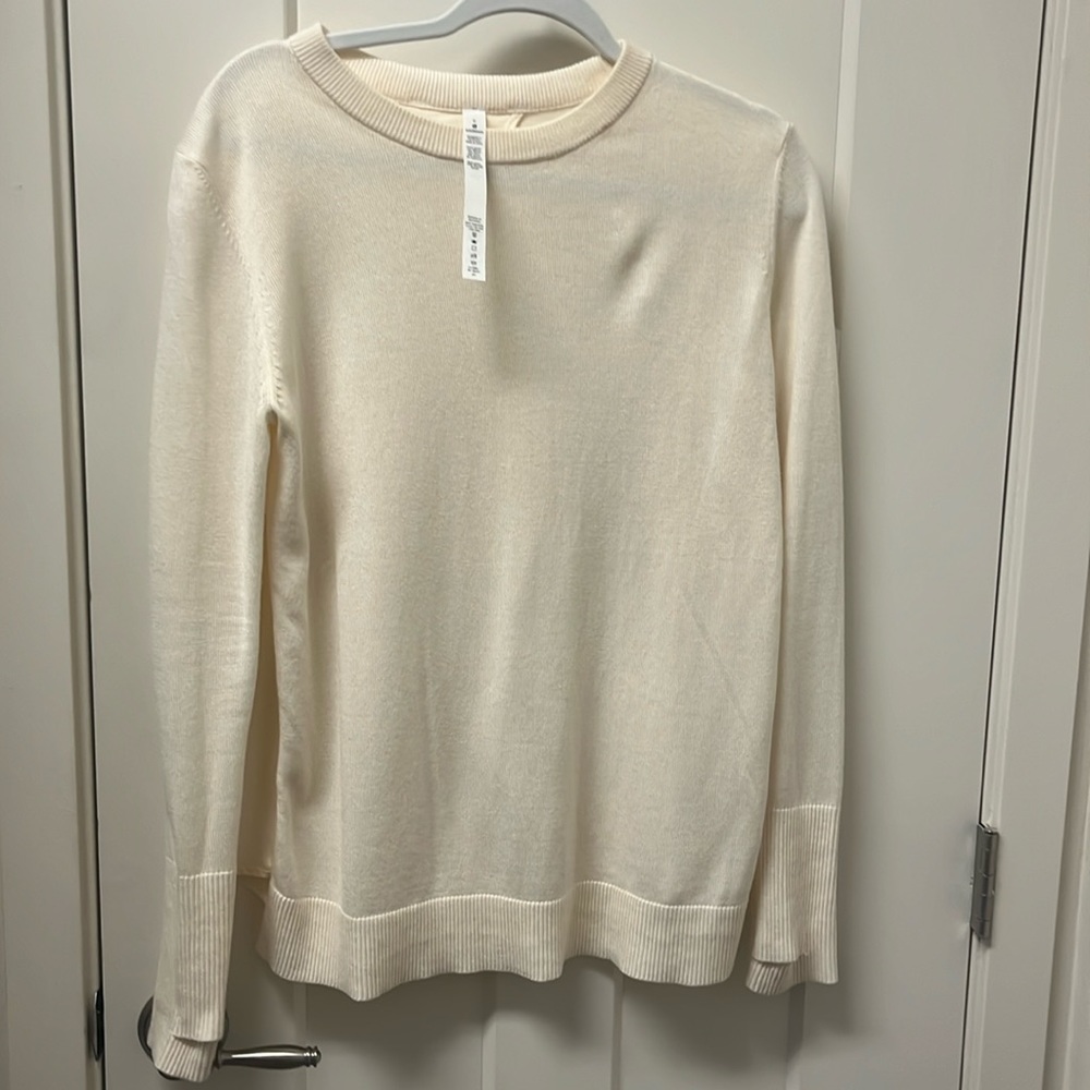 Long sleeve white Lululemon with fancy back